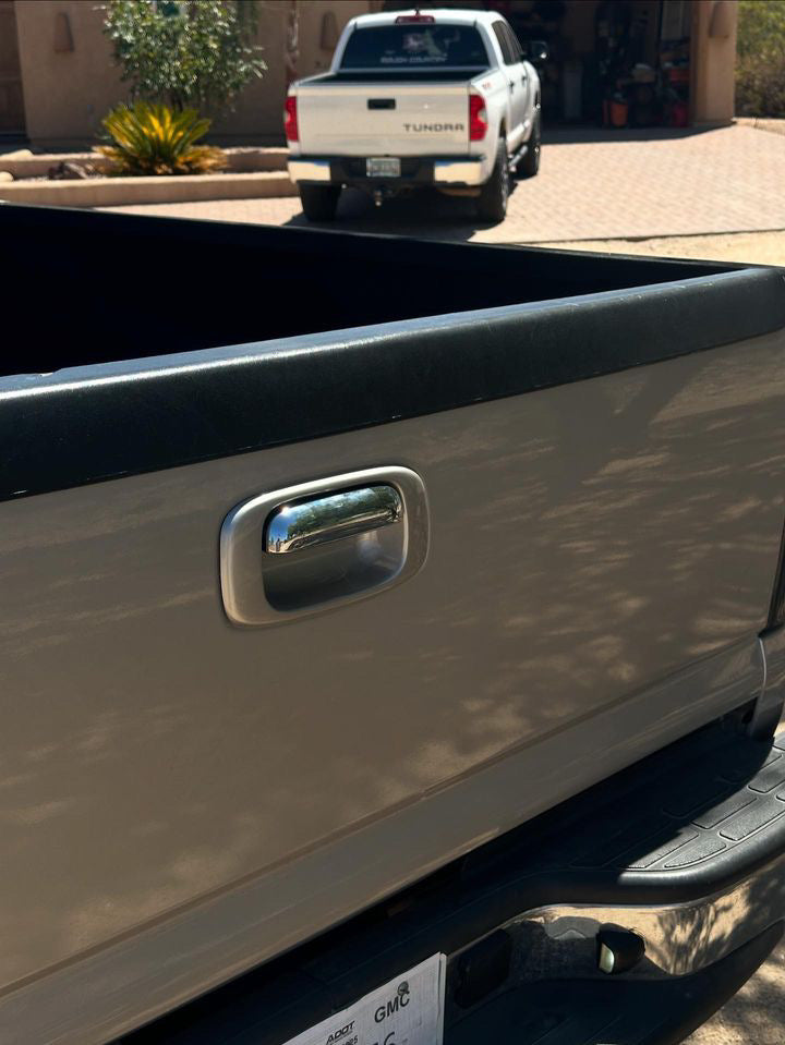 Color matched tail gate handle